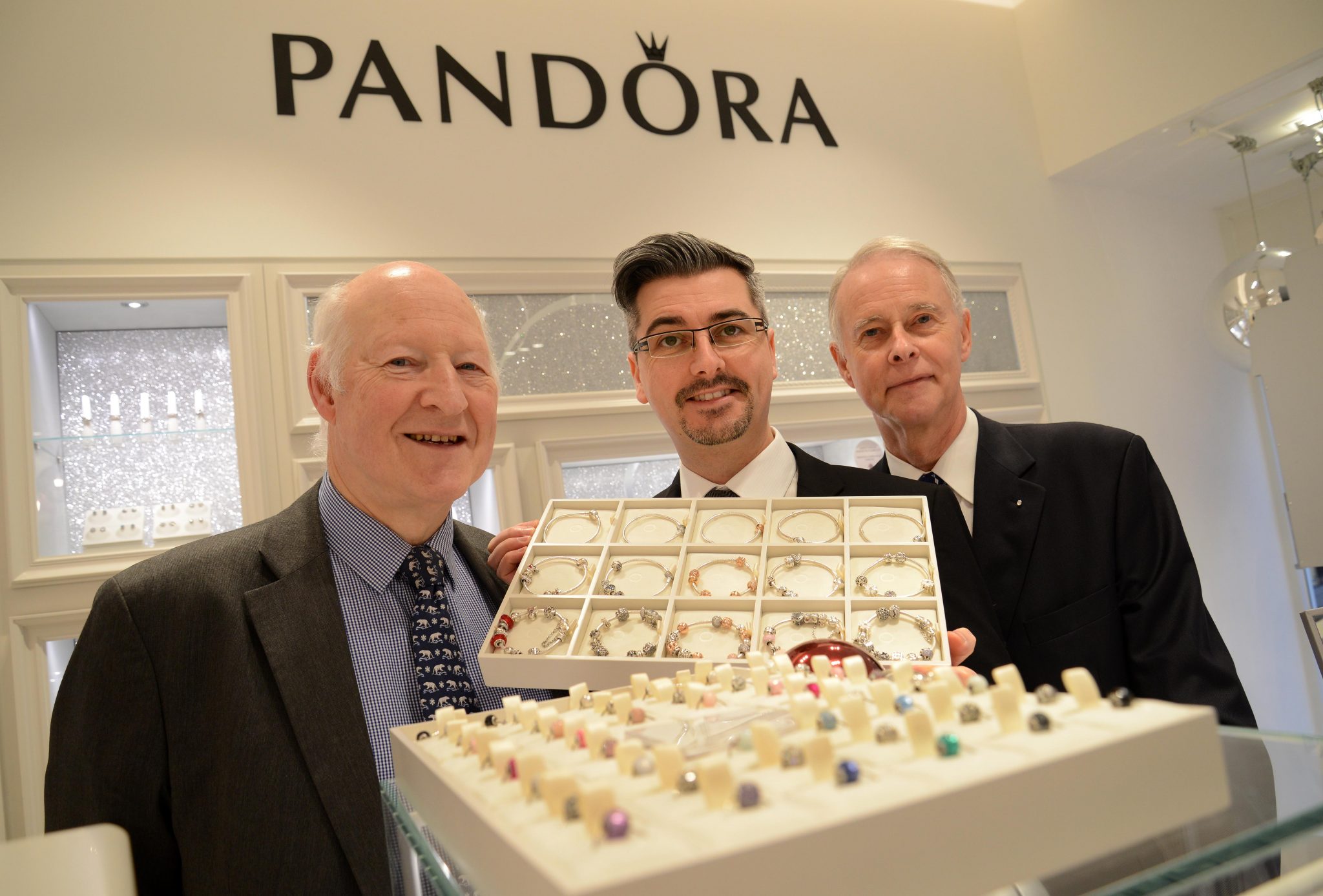 Peter Bramwell, Adam Wood (Latimer Hinks) and Bill Bramwell at the Pandora store, Prince Bishops, Durham