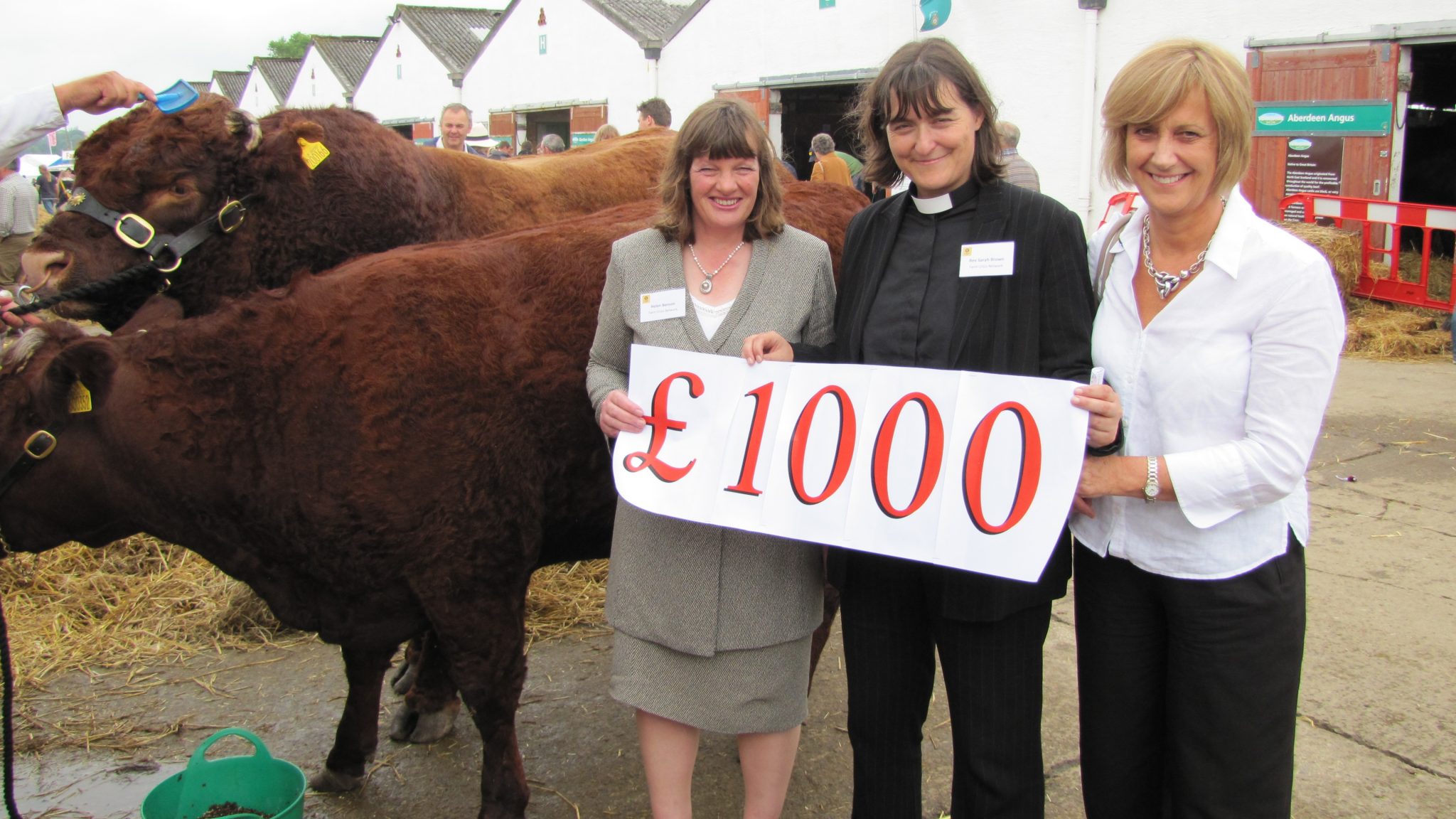 Image of Darlington based Latimer Hinks handing over their donation to the Farming Crisis Network.