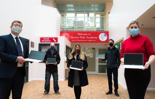 Image of staff from Hellens Group, Latimer Hinks Solicitors, Recognition PR, and Wharton Construction donating laptops to Darlington Primary Schools